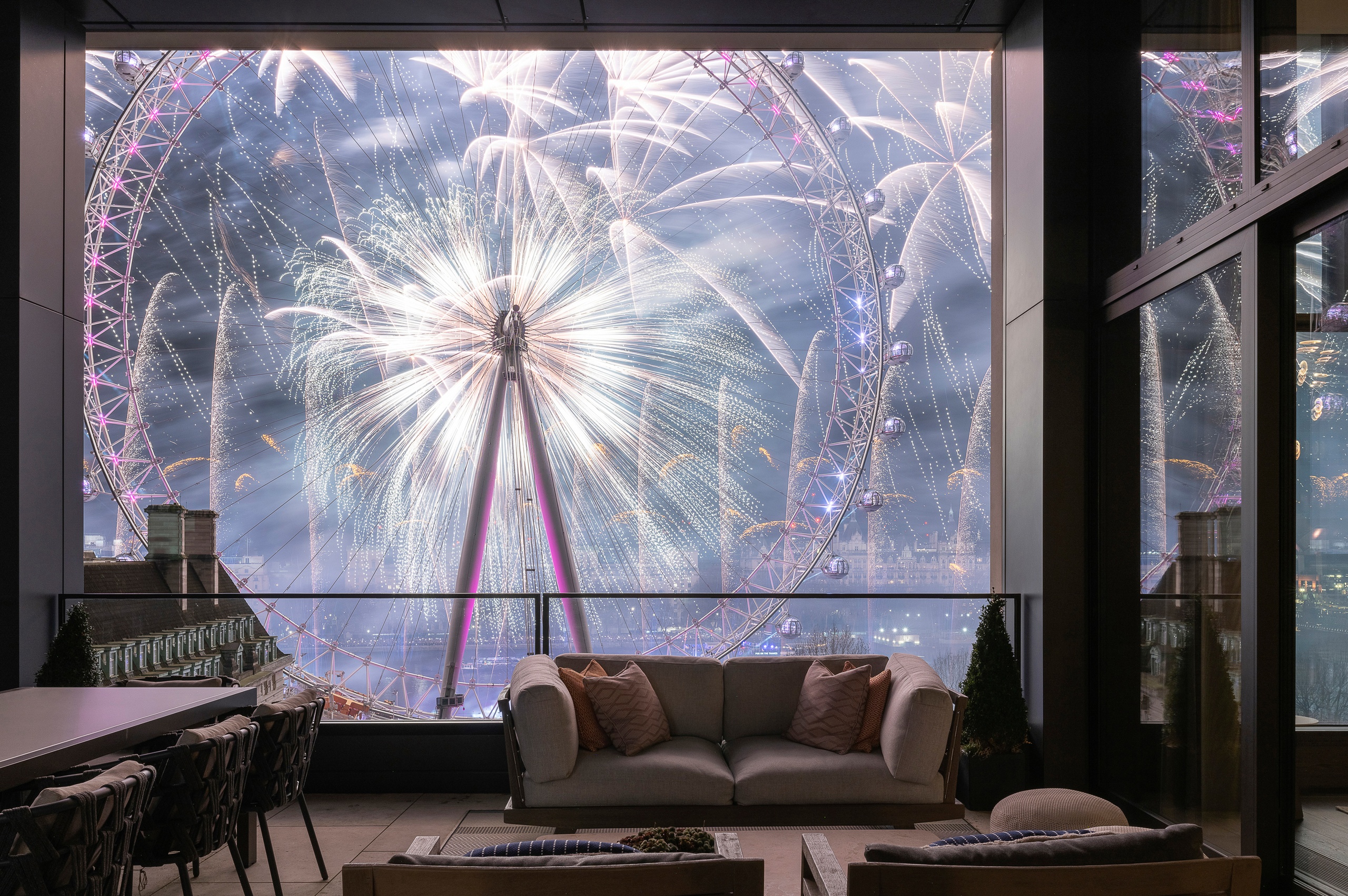 View of London Eye's fireworks from Southbank Place balcony